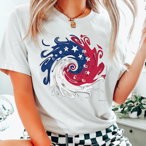 Woman wearing a t-shirt with a swirl of patriotic colors. Tap to go to Republic on Etsy.
